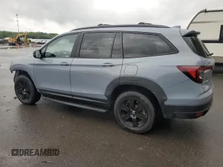 2022 Honda Pilot TrailSport z VIN 5FNYF6H81NB020409, wystawiony jako Copart lot #56401885 z przebiegiem 28 744 mil mil oraz Szkoda całkowita • Salvage title. Historia ofert i sprzedaży dostępna na DreamBid. Obrazek 2.