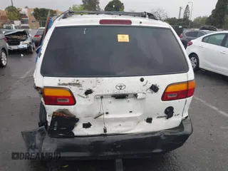 2000 Toyota Sienna LE z VIN 4T3ZF13C5YU248821, wystawiony jako IAAI lot #41782865 z przebiegiem Nie podano mil oraz . Historia ofert i sprzedaży dostępna na DreamBid. Obrazek 17.