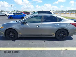 2017 Nissan Altima S with VIN 1N4AL3AP0HC297523, listed as a IAAI auction lot 42525818 with 162,767 mi miles and . Bid and sale history available at DreamBid. Image 13.