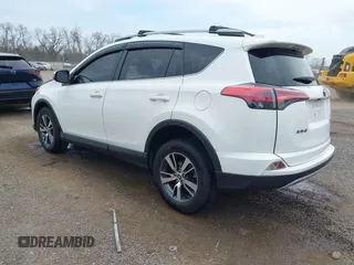 2018 Toyota RAV4 XLE with VIN JTMRFREV9JJ218173, listed as a IAAI auction lot 42037959 with 91,056 mi miles. Bid and sale history available at carsss.com. Image 3.