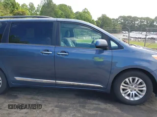 2016 Toyota Sienna XLE z VIN 5TDYK3DC0GS766059, wystawiony jako IAAI lot #42214738 z przebiegiem 143 001 mil mil oraz . Historia ofert i sprzedaży dostępna na DreamBid. Obrazek 13.