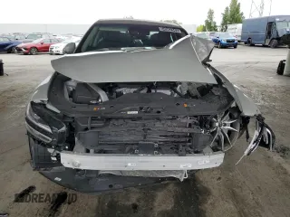 2025 Genesis G70 2.5T with VIN KMTG34SC6SU150874, listed as a Copart auction lot 54582345 with 9,410 mi miles and Salvage title. Bid and sale history available at DreamBid. Image 5.