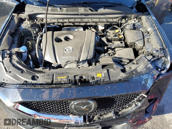2021 Mazda CX-5 Touring with VIN JM3KFBCM5M1484465, listed as a Copart auction lot 44201845 with 23,777 mi miles and Salvage Title. Bid and sale history available at carsss.com. Image 12.