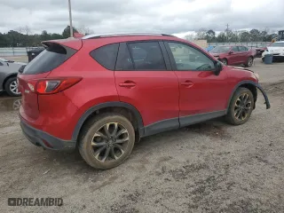 2016 Mazda CX-5 Grand Touring with VIN JM3KE2DY9G0678060, listed as a Copart auction lot 44690415 with 167,043 mi miles and Salvage Title. Bid and sale history available at carsss.com. Image 3.