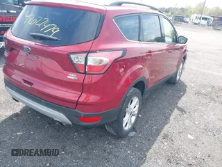 2018 Ford Escape SEL with VIN 1FMCU9HD6JUB74609, listed as a IAAI auction lot 42027479 with 54,935 mi miles. Bid and sale history available at carsss.com. Image 4.