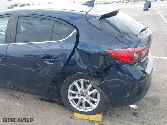 2016 Mazda Mazda3 i Grand Touring with VIN JM1BM1N74G1319656, listed as a IAAI auction lot 41561603 with 123,610 mi miles. Bid and sale history available at carsss.com. Image 6.