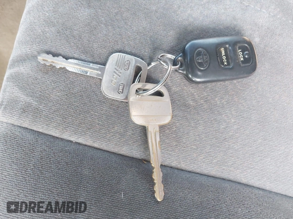 2001 Toyota Camry CE with VIN JT2BG22K010570556, listed as a IAAI auction lot 42458031 with 357,046 mi miles and . Bid and sale history available at DreamBid. Image 11.