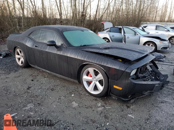 2010 Dodge Challenger SRT-8 with VIN 2B3CJ7DW8AH104011, listed as a Copart auction lot 87216334 with 55,519 mi miles and Salvage title. Bid and sale history available at DreamBid. Image 4.