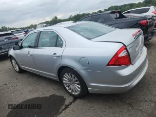 2012 Ford Fusion Hybrid z VIN 3FADP0L34CR227740, wystawiony jako Copart lot #64989475 z przebiegiem 134 862 mil mil oraz Szkoda całkowita • Salvage title. Historia ofert i sprzedaży dostępna na DreamBid. Obrazek 2.
