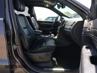 2014 Jeep Grand Cherokee Limited z VIN 1C4RJFBT0EC241030, wystawiony jako IAAI lot #41851316 z przebiegiem 104 344 mil mil oraz . Historia ofert i sprzedaży dostępna na DreamBid. Obrazek 5.