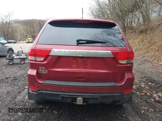 2012 Jeep Grand Cherokee Laredo with VIN 1C4RJFAG7CC123669, listed as a IAAI auction lot 42001472 with 164,806 mi miles. Bid and sale history available at carsss.com. Image 17.