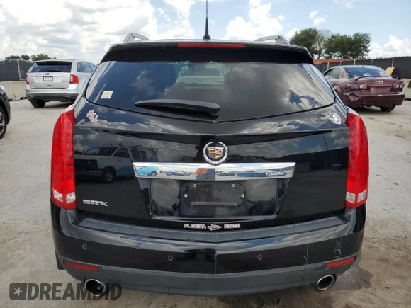 2011 Cadillac SRX Premium Collection z VIN 3GYFNCEY7BS672218, wystawiony jako Copart lot #66852915 z przebiegiem 119 917 mil mil oraz Czysty tytuł • Clean title. Historia ofert i sprzedaży dostępna na DreamBid. Obrazek 6.