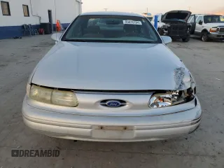 1995 Ford Taurus GL with VIN 1FALP52U5SA320424, listed as a Copart auction lot 83676194 with 177,817 mi miles and Salvage title. Bid and sale history available at DreamBid. Image 5.