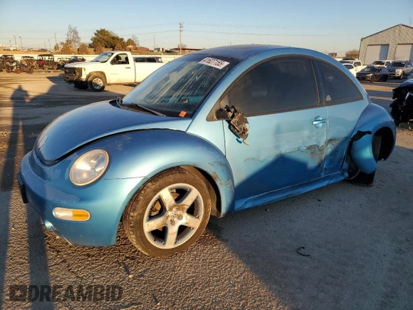 2004 Volkswagen New Beetle Coupe Satellite Blue with VIN 3VWGK31CX4M419900, listed as a Copart auction lot 41627155 with 129,510 mi miles and Salvage Title. Bid and sale history available at carsss.com. Image 1.