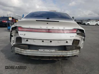2013 Lincoln MKZ Hybrid z VIN 3LN6L2LU9DR818064, wystawiony jako Copart lot #53831705 z przebiegiem 97 464 mil mil oraz Szkoda całkowita • Salvage title. Historia ofert i sprzedaży dostępna na DreamBid. Obrazek 6.