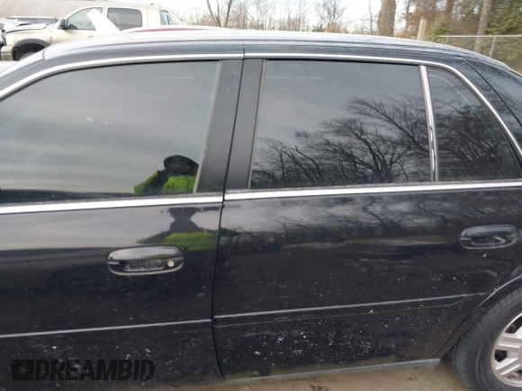 2003 Cadillac DeVille with VIN 1G6KD54Y33U126184, listed as a IAAI auction lot 41385354 with 83,982 mi miles. Bid and sale history available at carsss.com. Image 14.