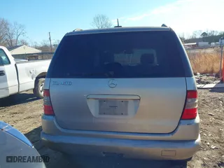 2001 Mercedes-Benz M-Class with VIN 4JGAB72E51A247926, listed as a IAAI auction lot 41277111 with 208,817 mi miles. Bid and sale history available at carsss.com. Image 6.