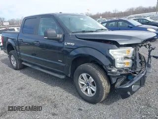 2015 Ford F-150 XLT with VIN 1FTEW1EP8FFB13605, listed as a IAAI auction lot 41566536 with 97,698 mi miles. Bid and sale history available at carsss.com. Image 1.