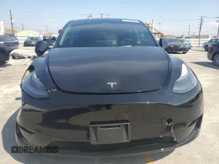 2022 Tesla Model Y Performance with VIN 7SAYGDEF6NF524171, listed as a Copart auction lot 60736945 with 30,629 mi miles and Salvage title. Bid and sale history available at DreamBid. Image 5.