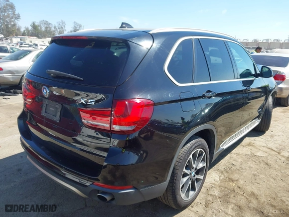 2017 BMW X5 sDrive35i with VIN 5UXKR2C5XH0U17833, listed as a IAAI auction lot 41856074 with 115,666 mi miles. Bid and sale history available at carsss.com. Image 4.
