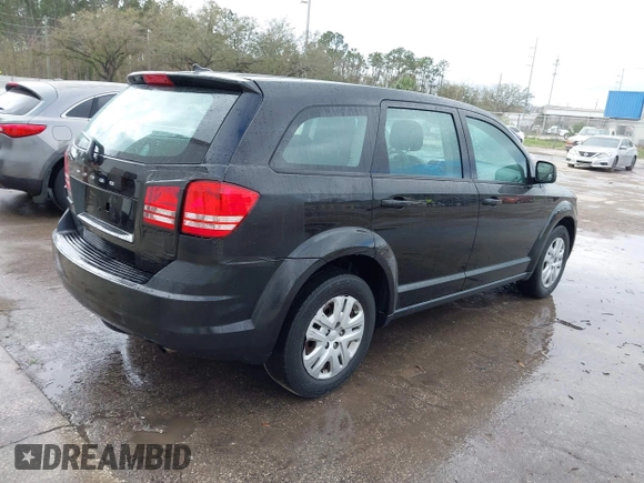 2015 Dodge Journey American Value Pkg with VIN 3C4PDCABXFT637428, listed as a IAAI auction lot 41507850 with 209,050 mi miles. Bid and sale history available at carsss.com. Image 4.