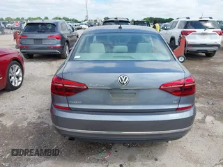 2017 Volkswagen Passat S z VIN 1VWAT7A32HC085122, wystawiony jako IAAI lot #42204880 z przebiegiem 61 935 mil mil oraz . Historia ofert i sprzedaży dostępna na DreamBid. Obrazek 16.