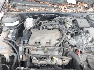 1999 Pontiac Grand Am SE1 with VIN 1G2NE52E5XC575530, listed as a IAAI auction lot 41725461 with 192,009 mi miles. Bid and sale history available at carsss.com. Image 10.