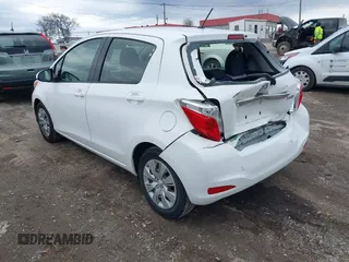 2014 Toyota Yaris L with VIN JTDKTUD34ED589582, listed as a IAAI auction lot 41538884 with 87,798 mi miles. Bid and sale history available at carsss.com. Image 3.
