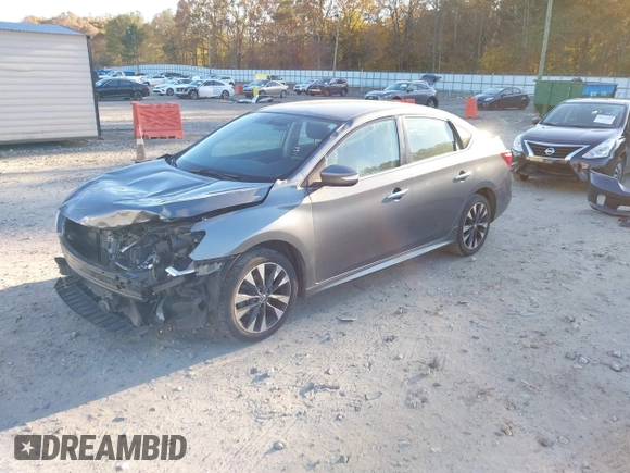 2019 Nissan Sentra S z VIN 3N1AB7APXKY265054, wystawiony jako IAAI lot #40929593 z przebiegiem 75 298 mil mil oraz . Historia ofert i sprzedaży dostępna na DreamBid. Obrazek 2.