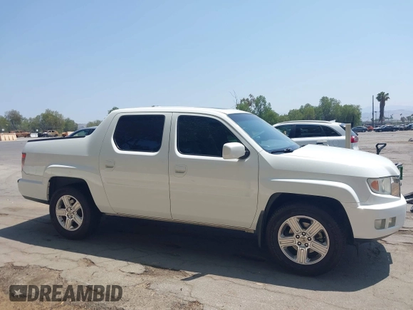 2012 Honda Ridgeline RTL z VIN 5FPYK1F57CB455267, wystawiony jako IAAI lot #42462296 z przebiegiem 186 451 mil mil oraz . Historia ofert i sprzedaży dostępna na DreamBid. Obrazek 13.