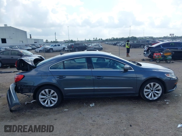 2009 Volkswagen CC Sport with VIN WVWML73C79E553395, listed as a IAAI auction lot 42078061 with 167,110 mi miles. Bid and sale history available at carsss.com. Image 14.