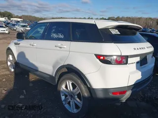 2013 Land Rover Range Rover Evoque Pure z VIN SALVN2BG2DH739464, wystawiony jako IAAI lot #41661683 z przebiegiem 103 227 mil mil oraz . Historia ofert i sprzedaży dostępna na DreamBid. Obrazek 3.