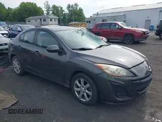 2011 Mazda 3 i Touring with VIN JM1BL1VG8B1448205, listed as a IAAI auction lot 42696701 with 99,832 mi miles and . Bid and sale history available at DreamBid. Image 1.