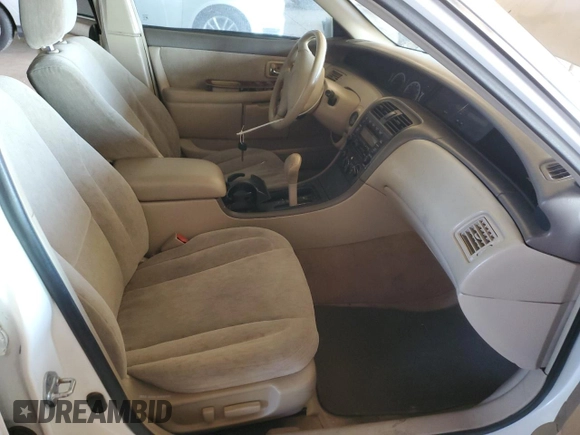 2001 Toyota Avalon XL with VIN 4T1BF28B71U123194, listed as a Copart auction lot 84050604 with 199,807 mi miles and Salvage Title. Bid and sale history available at DreamBid. Image 7.
