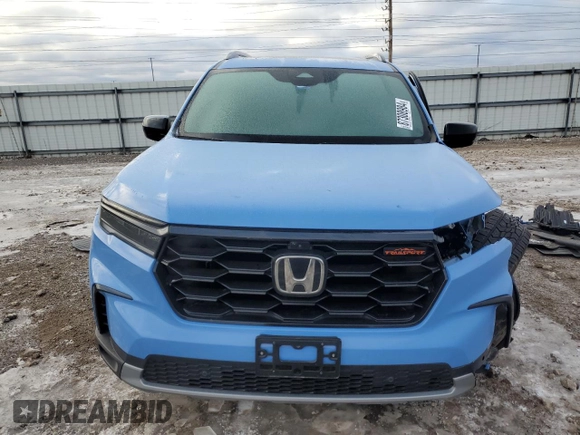 2025 Honda Pilot TrailSport with VIN 5FNYG1H63SB007882, listed as a Copart auction lot 87308984 with 3,980 mi miles and Salvage Title. Bid and sale history available at carsss.com. Image 5.