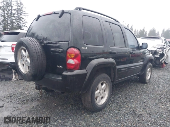 2002 Jeep Liberty Limited with VIN 1J8GL58KX2W198975, listed as a IAAI auction lot 41200746 with 220,079 mi miles and . Bid and sale history available at DreamBid. Image 4.