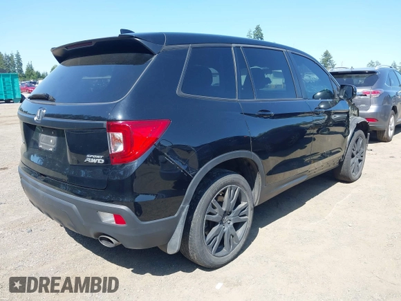 2021 Honda Passport Sport with VIN 5FNYF8H24MB004923, listed as a IAAI auction lot 42374410 with 144,314 mi miles and . Bid and sale history available at DreamBid. Image 4.