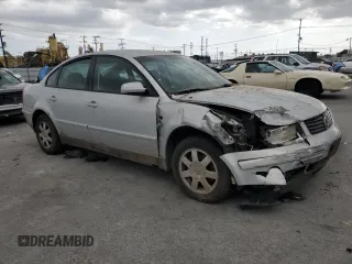 2000 Volkswagen Passat z VIN WVWMA23B3YP228438, wystawiony jako Copart lot #48724625 z przebiegiem 204 670 mil mil oraz Szkoda całkowita • Salvage title. Historia ofert i sprzedaży dostępna na DreamBid. Obrazek 4.