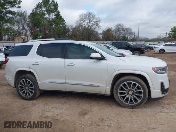 2021 GMC Acadia Denali with VIN 1GKKNPLS1MZ139821, listed as a IAAI auction lot 41455357 with 61,265 mi miles and . Bid and sale history available at carsss.com. Image 13.