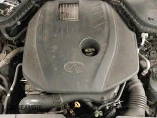 2016 Infiniti Q50 Premium z VIN JN1CV7APXGM202613, wystawiony jako IAAI lot #41707316 z przebiegiem 250 021 mil mil oraz . Historia ofert i sprzedaży dostępna na DreamBid. Obrazek 19.
