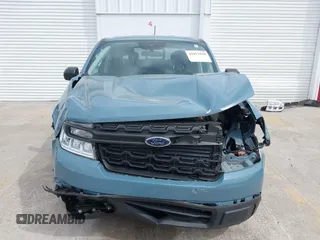 2023 Ford Maverick XL z VIN 3FTTW8E37PRA74216, wystawiony jako IAAI lot #41852290 z przebiegiem 21 849 mil mil oraz . Historia ofert i sprzedaży dostępna na DreamBid. Obrazek 13.