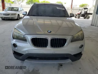 2014 BMW X1 sDrive28i z VIN WBAVM1C57EVW50653, wystawiony jako Copart lot #57309385 z przebiegiem Nie podano mil oraz Szkoda całkowita • Salvage title. Historia ofert i sprzedaży dostępna na DreamBid. Obrazek 5.