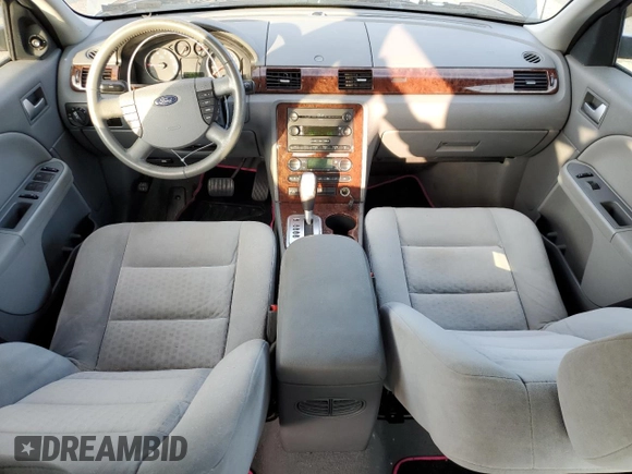 2005 Ford Five Hundred SEL with VIN 1FAFP24175G103683, listed as a Copart auction lot 74348284 with 0 mi miles and Salvage Title. Bid and sale history available at carsss.com. Image 8.