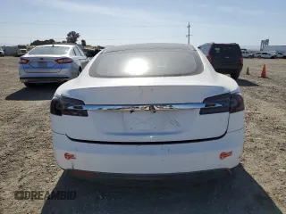 2014 Tesla Model S 60 z VIN 5YJSA1S11EFP41087, wystawiony jako Copart lot #58346805 z przebiegiem Nie podano mil oraz Szkoda całkowita • Salvage title. Historia ofert i sprzedaży dostępna na DreamBid. Obrazek 6.