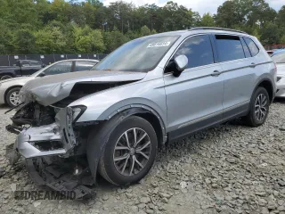 2020 Volkswagen Tiguan SE with VIN 3VV2B7AX4LM022562, listed as a Copart auction lot 69816034 with 61,789 mi miles and Salvage Title. Bid and sale history available at DreamBid. Image 1.