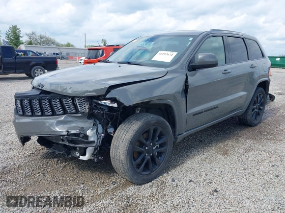 2021 Jeep Grand Cherokee Laredo E with VIN 1C4RJFAG4MC700384, listed as a IAAI auction lot 42192672 with 54,525 mi miles and . Bid and sale history available at DreamBid. Image 2.