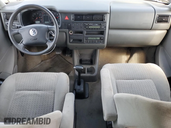 2003 Volkswagen EuroVan MV с VIN WV2MB47023H044047, выставлен на аукционе Copart как лот 71014624 с пробегом 189 485 миль миль и Чистый • Clean title. История ставок и продаж доступна на DreamBid. Изображение 8.