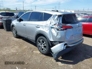 2017 Toyota RAV4 LE with VIN 2T3BFREVXHW546618, listed as a IAAI auction lot 42015842 with 116,888 mi miles and . Bid and sale history available at carsss.com. Image 3.