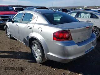 2014 Dodge Avenger SE with VIN 1C3CDZAB7EN144102, listed as a IAAI auction lot 41635691 with 201,428 mi miles and . Bid and sale history available at DreamBid. Image 3.