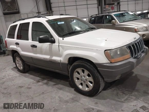 2000 Jeep Grand Cherokee Laredo z VIN 1J4GW48NXYC244327, wystawiony jako IAAI lot #41832166 z przebiegiem 250 822 mil mil oraz . Historia ofert i sprzedaży dostępna na DreamBid. Obrazek 1.